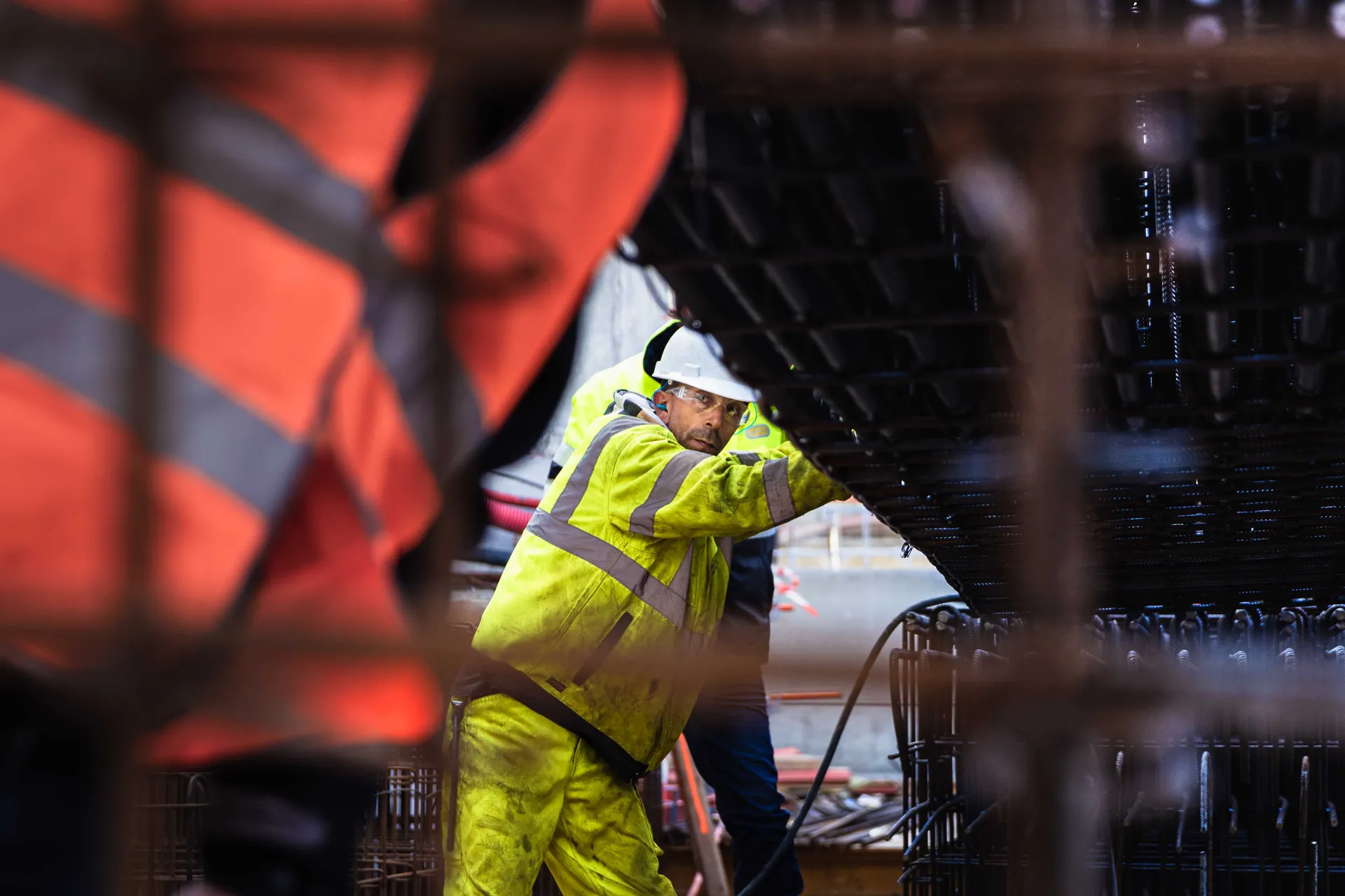 Photographe de chantier à Paris — ouvrier sur un chantier Bouygues Construction